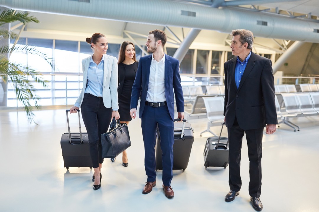 Business travellers using private group transport